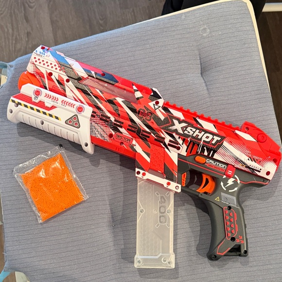 X-Shot Red and Black Toy Blaster - Picture 2 of 3